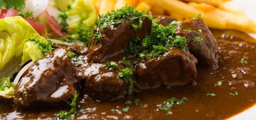 Bucataria belgiana ofera un tur gastronomic care incita papilele gustative. Top 10 specialitati culinare pe care le puteti incerca intr-o calatorie in Belgia